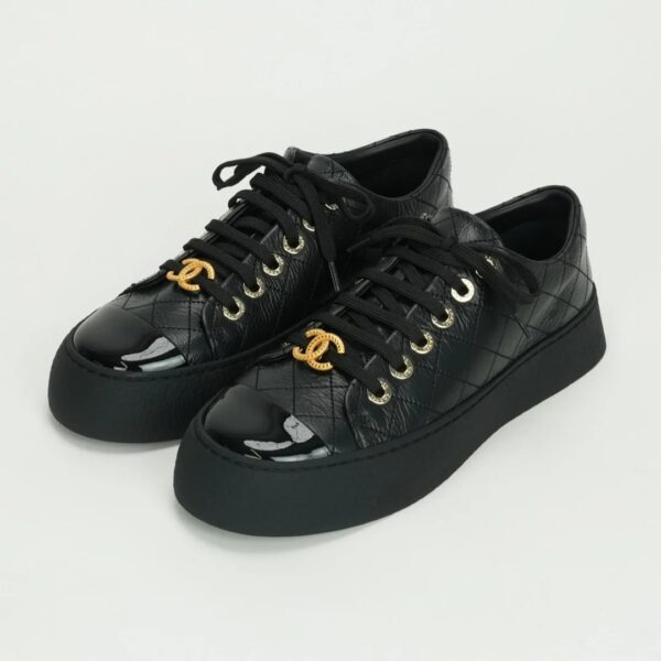 CHANEL Black leather sneakers