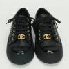 CHANEL Black leather sneakers