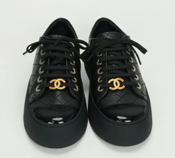 CHANEL Black leather sneakers